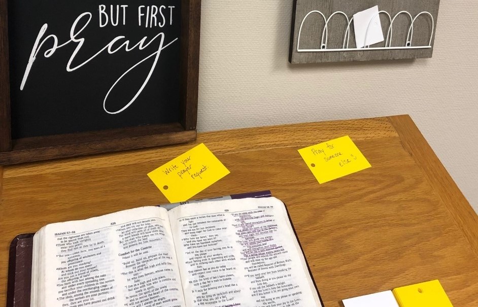 Prayer Room campus ministry desk with Bible